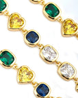 Pharrell Williams grills are studded with sapphires, rubies and emeralds. INFINITY GAUNTLETS jewelry diamond choker jacob & co short necklace gemstone heart Gabby Elan Jewelry infinity stone grillz grill grills