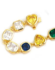 Pharrell Williams grills are studded with sapphires, rubies and emeralds. INFINITY GAUNTLETS jewelry diamond choker jacob & co short necklace gemstone heart Gabby Elan Jewelry infinity stone grillz grill grills