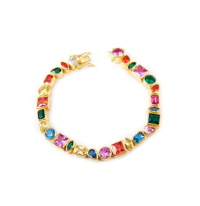 Pharrell Williams grills are studded with sapphires, rubies and emeralds. INFINITY GAUNTLETS jewelry diamond choker jacob & co short necklace gemstone heart Gabby Elan Jewelry infinity stone grillz grill grills