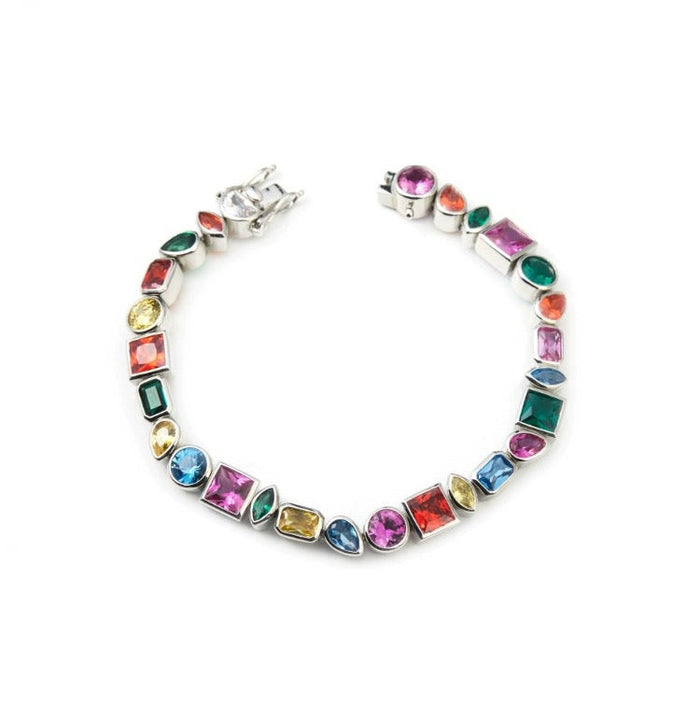 Pharrell Williams grills are studded with sapphires, rubies and emeralds. INFINITY GAUNTLETS jewelry diamond choker jacob & co short necklace gemstone heart Gabby Elan Jewelry infinity stone grillz grill grills