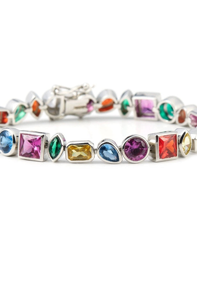 Pharrell Williams grills are studded with sapphires, rubies and emeralds. INFINITY GAUNTLETS jewelry diamond choker jacob & co short necklace gemstone heart Gabby Elan Jewelry infinity stone grillz grill grills