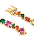 Pharrell Williams grills are studded with sapphires, rubies and emeralds. INFINITY GAUNTLETS jewelry diamond choker jacob & co short necklace gemstone heart Gabby Elan Jewelry infinity stone grillz grill grills