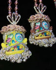 Travis Scott recently got pretty generous with his team, gifting his inner circle iced-out Takashi Murakami-designed chains from Eliantte