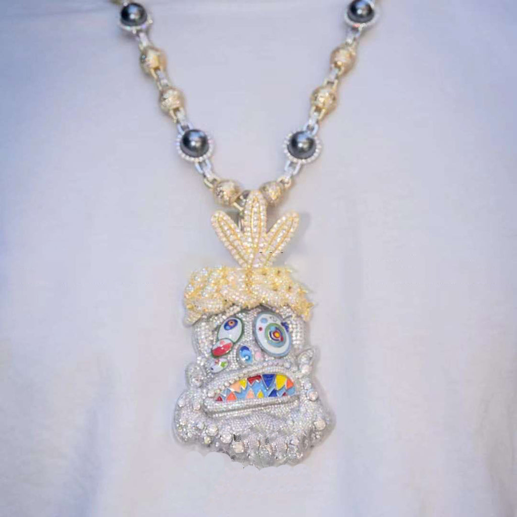 Travis Scott recently got pretty generous with his team, gifting his inner circle iced-out Takashi Murakami-designed chains from Eliantte