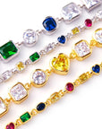 Pharrell Williams grills are studded with sapphires, rubies and emeralds. INFINITY GAUNTLETS jewelry diamond choker jacob & co short necklace gemstone heart Gabby Elan Jewelry infinity stone grillz grill grills
