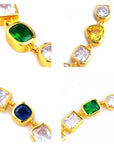 Pharrell Williams grills are studded with sapphires, rubies and emeralds. INFINITY GAUNTLETS jewelry diamond choker jacob & co short necklace gemstone heart Gabby Elan Jewelry infinity stone grillz grill grills