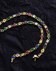 Pharrell Williams grills are studded with sapphires, rubies and emeralds. INFINITY GAUNTLETS jewelry diamond choker jacob & co short necklace gemstone heart Gabby Elan Jewelry infinity stone grillz grill grills