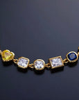 Pharrell Williams grills are studded with sapphires, rubies and emeralds. INFINITY GAUNTLETS jewelry diamond choker jacob & co short necklace gemstone heart Gabby Elan Jewelry infinity stone grillz grill grills