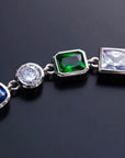 Pharrell Williams grills are studded with sapphires, rubies and emeralds. INFINITY GAUNTLETS jewelry diamond choker jacob & co short necklace gemstone heart Gabby Elan Jewelry infinity stone grillz grill grills