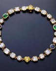 Pharrell Williams grills are studded with sapphires, rubies and emeralds. INFINITY GAUNTLETS jewelry diamond choker jacob & co short necklace gemstone heart Gabby Elan Jewelry infinity stone grillz grill grills