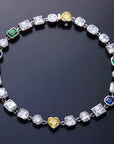 Pharrell Williams grills are studded with sapphires, rubies and emeralds. INFINITY GAUNTLETS jewelry diamond choker jacob & co short necklace gemstone heart Gabby Elan Jewelry infinity stone grillz grill grills
