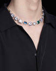 Pharrell Williams grills are studded with sapphires, rubies and emeralds. INFINITY GAUNTLETS jewelry diamond choker jacob & co short necklace gemstone heart Gabby Elan Jewelry infinity stone grillz grill grills