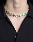 Pharrell Williams grills are studded with sapphires, rubies and emeralds. INFINITY GAUNTLETS jewelry diamond choker jacob & co short necklace gemstone heart Gabby Elan Jewelry infinity stone grillz grill grills