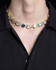 Pharrell Williams grills are studded with sapphires, rubies and emeralds. INFINITY GAUNTLETS jewelry diamond choker jacob & co short necklace gemstone heart Gabby Elan Jewelry infinity stone grillz grill grills