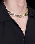 Pharrell Williams grills are studded with sapphires, rubies and emeralds. INFINITY GAUNTLETS jewelry diamond choker jacob & co short necklace gemstone heart Gabby Elan Jewelry infinity stone grillz grill grills