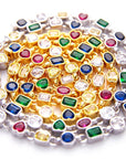 Pharrell Williams grills are studded with sapphires, rubies and emeralds. INFINITY GAUNTLETS jewelry diamond choker jacob & co short necklace gemstone heart Gabby Elan Jewelry infinity stone grillz grill grills