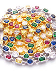 Pharrell Williams grills are studded with sapphires, rubies and emeralds. INFINITY GAUNTLETS jewelry diamond choker jacob & co short necklace gemstone heart Gabby Elan Jewelry infinity stone grillz grill grills