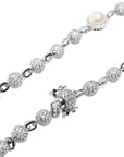 Travis Scott recently got pretty generous with his team, gifting his inner circle iced-out Takashi Murakami-designed chains from Eliantte