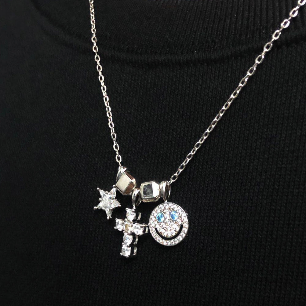 Smiling face blue eyes cross star block combo