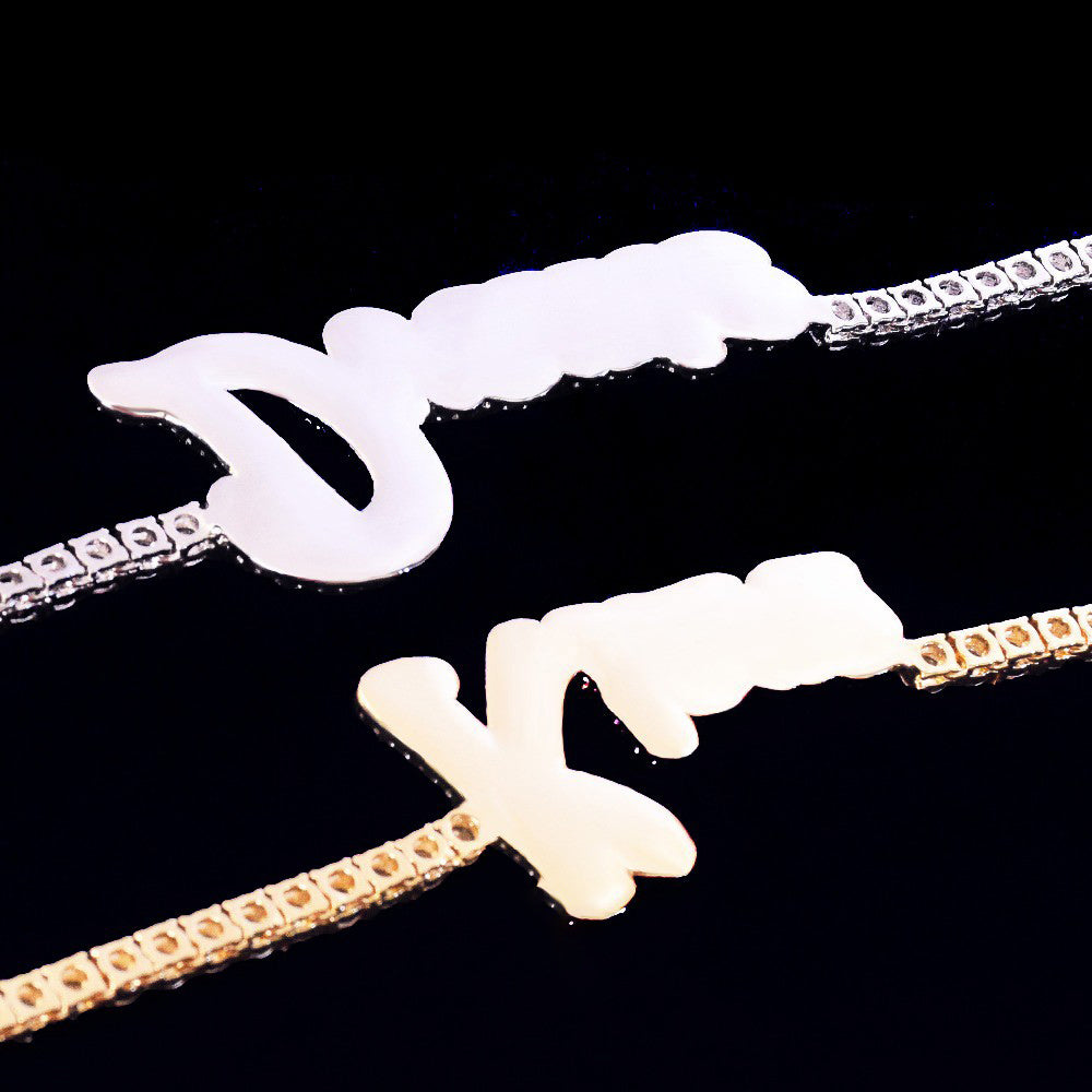 Hailey Bieber Wears Diamond Necklace With Her Married Last Name Vogue people.com custom name diamond necklace tennis link chain