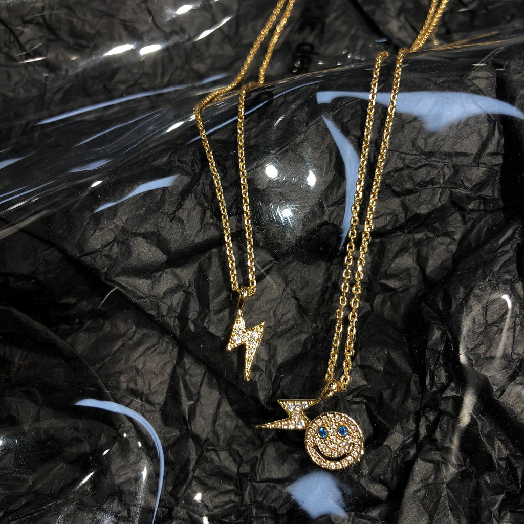 eyefunny smiling face thunder pendant necklace chain diamond jbalvin kim jones clot virgil offwhite