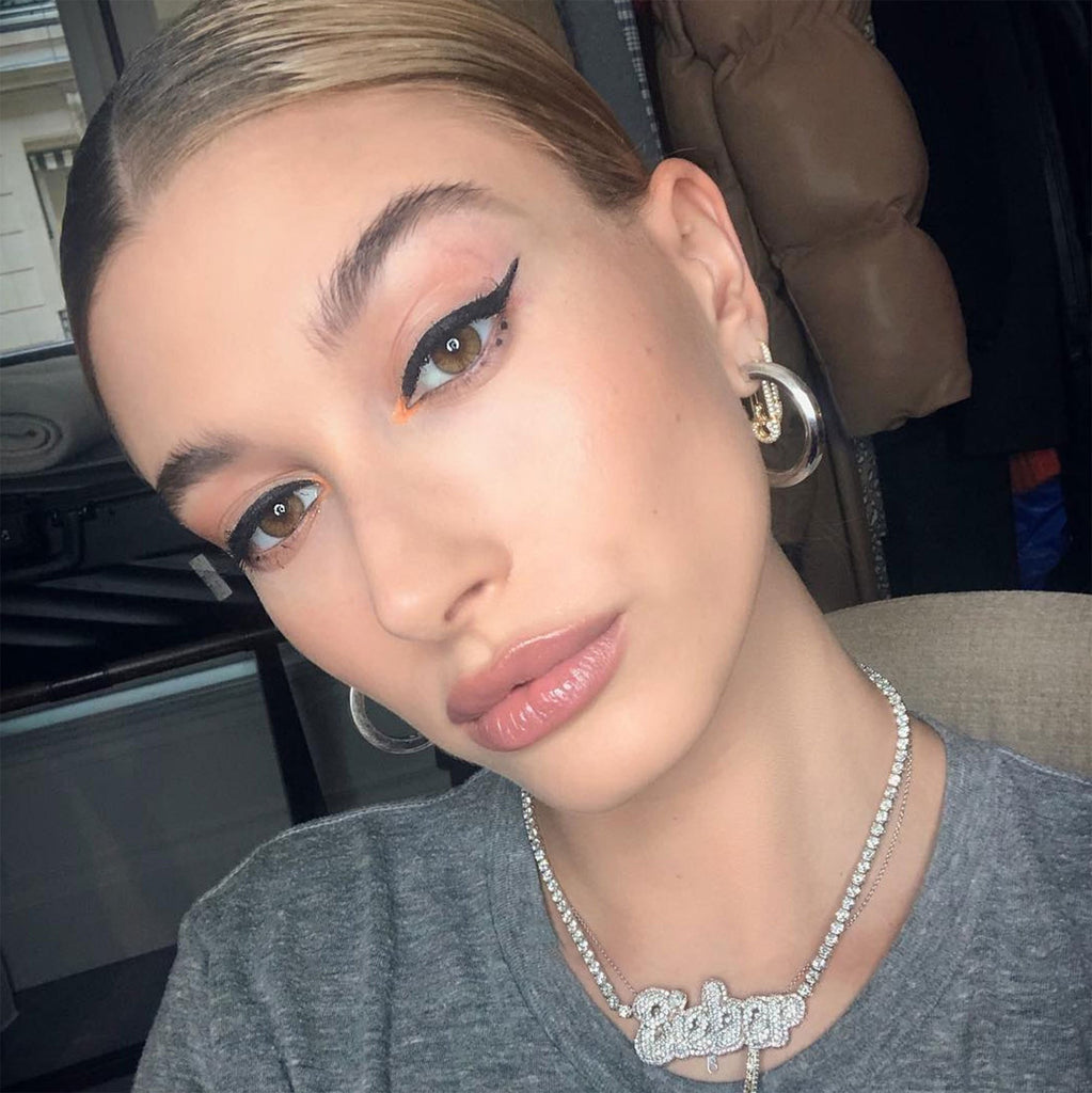Hailey Bieber Wears Diamond Necklace With Her Married Last Name Vogue people.com custom name diamond necklace tennis link chain