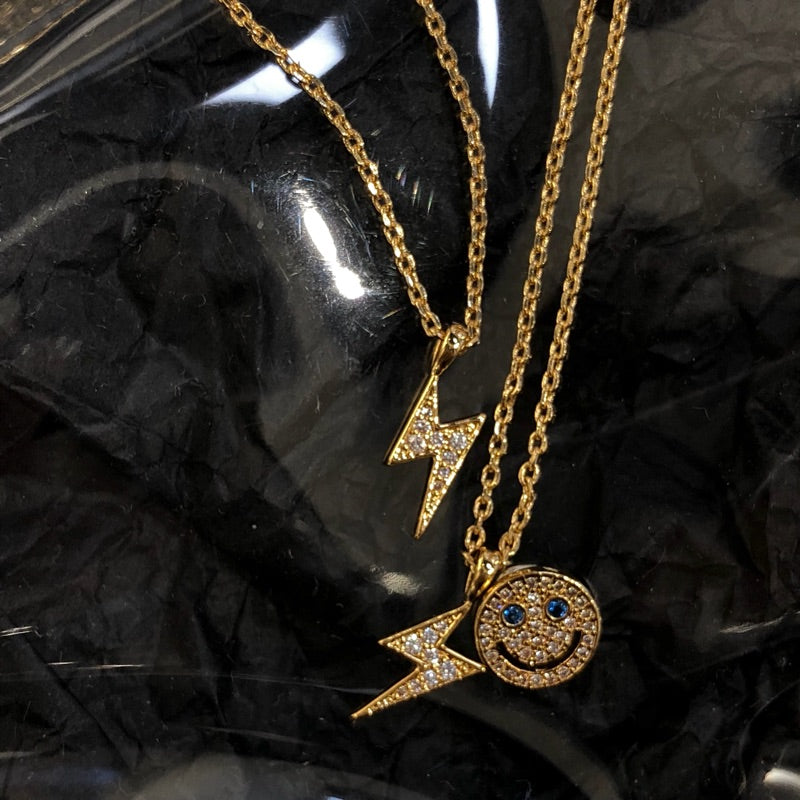 eyefunny smiling face thunder pendant necklace chain diamond jbalvin kim jones clot virgil offwhite