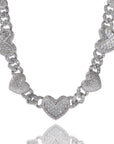 Grammys 2022 diamond heart necklace Megan Thee Stallion rocks an icy blonde bob and a sparkly mini dress Daily Mail diamond heart necklace hip hop jewelry celebrity jewelers