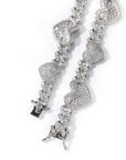 Grammys 2022 diamond heart necklace Megan Thee Stallion rocks an icy blonde bob and a sparkly mini dress Daily Mail diamond heart necklace hip hop jewelry celebrity jewelers