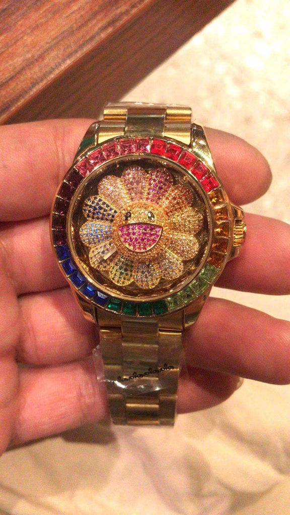 Hublot introduces Classic Fusion Takashi Murakami All Black limited edition watch featuring the artist's signature smiling flower.
