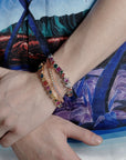 Pharrell Williams grills are studded with sapphires, rubies and emeralds. INFINITY GAUNTLETS jewelry diamond choker jacob & co short necklace gemstone heart Gabby Elan Jewelry infinity stone grillz grill grills