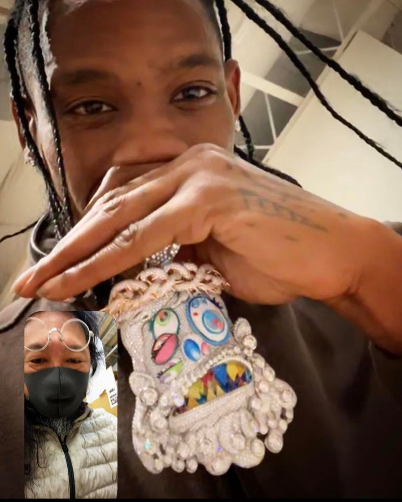 Travis Scott recently got pretty generous with his team, gifting his inner circle iced-out Takashi Murakami-designed chains from Eliantte