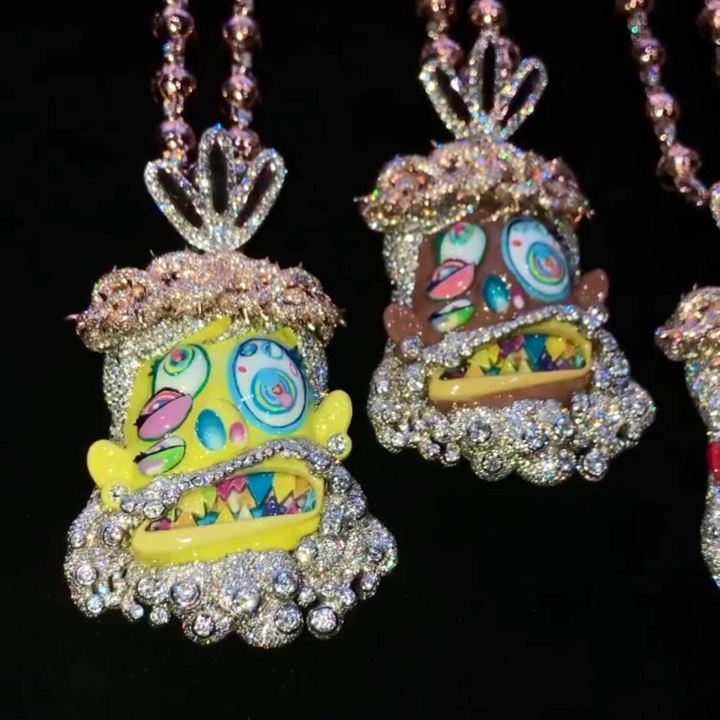 Travis Scott recently got pretty generous with his team, gifting his inner circle iced-out Takashi Murakami-designed chains from Eliantte