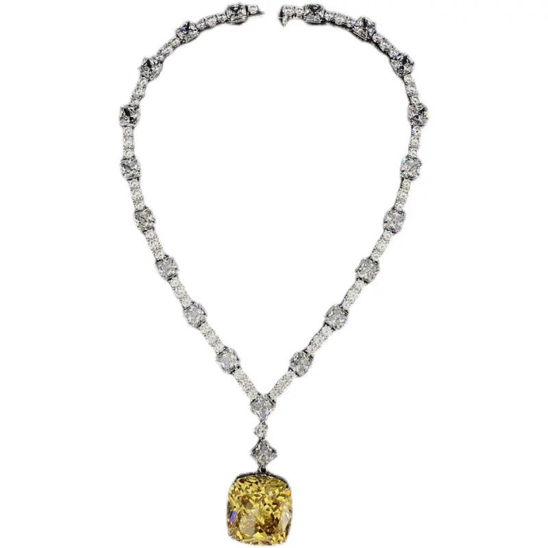 Beyoncé's Tiffany &amp; Co diamond necklace is worth $30 million harpersbazaar.com tiffany yellow diamond necklace beyonce' from The 128-carat yellow diamond was worn by Hepburn during the Breakfast At Tiffany's press tour in 1961, and was seen again on Lady Gaga