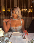 Grammys 2022 diamond heart necklace Megan Thee Stallion rocks an icy blonde bob and a sparkly mini dress Daily Mail diamond heart necklace hip hop jewelry celebrity jewelers