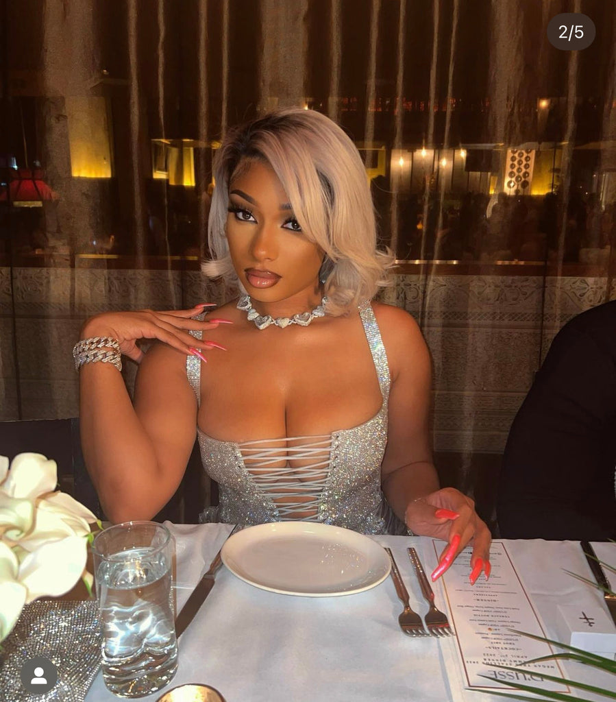 Grammys 2022 diamond heart necklace Megan Thee Stallion rocks an icy blonde bob and a sparkly mini dress Daily Mail diamond heart necklace hip hop jewelry celebrity jewelers