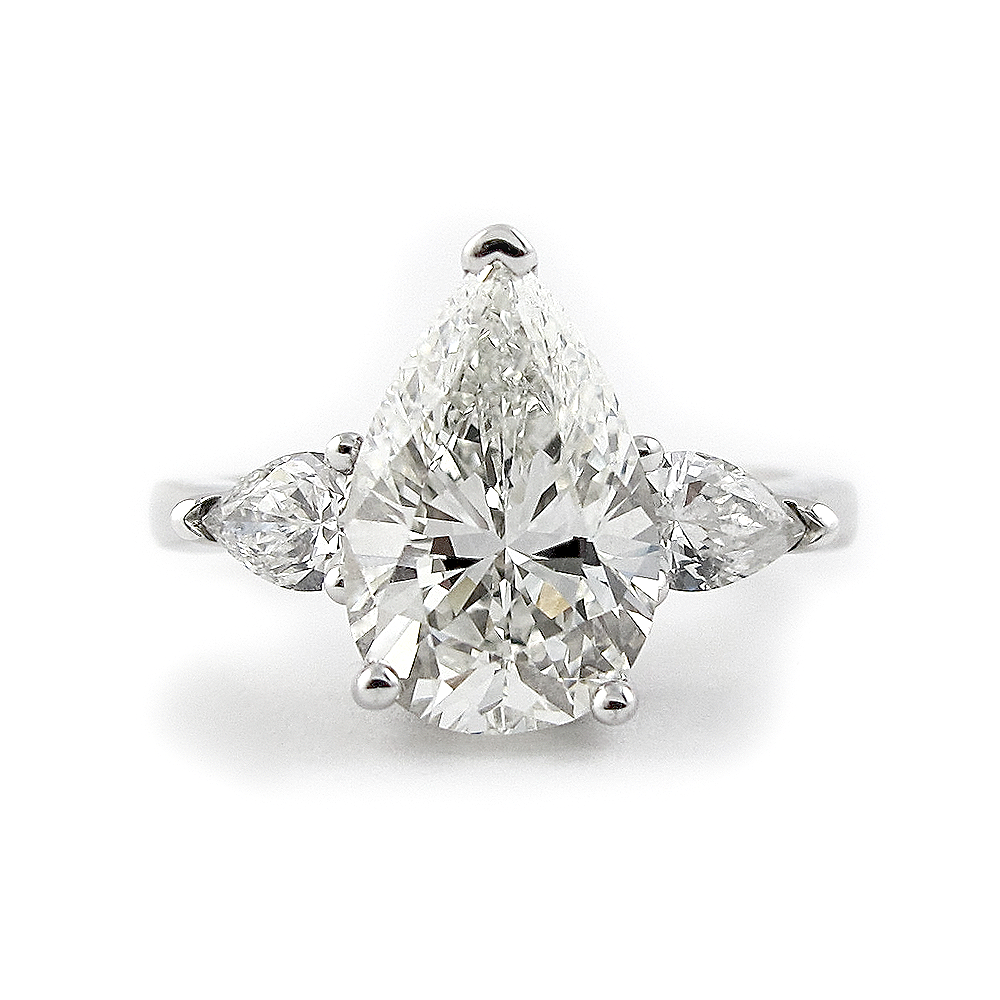 asap rocky pear diamond ring unique three stone engagement ring jeweler vvs 