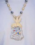 Travis Scott recently got pretty generous with his team, gifting his inner circle iced-out Takashi Murakami-designed chains from Eliantte