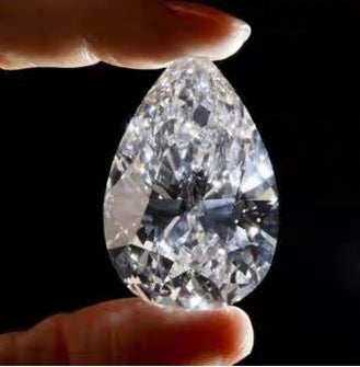 Travis Scott Gives Kylie Jenner and Stormi Webster Matching Diamond Rings