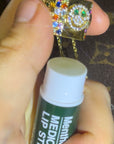 EYEFUNNY アイファニー Daniel Arsham Smiley gold cap with diamanté detailing designed by EYEFUNNY DanielArsham fully iced diamond eyefunny lip balm cap holder necklace