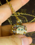 EYEFUNNY アイファニー Daniel Arsham Smiley gold cap with diamanté detailing designed by EYEFUNNY DanielArsham fully iced diamond eyefunny lip balm cap holder necklace