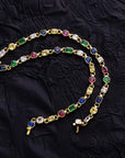 Pharrell Williams grills are studded with sapphires, rubies and emeralds. INFINITY GAUNTLETS jewelry diamond choker jacob & co short necklace gemstone heart Gabby Elan Jewelry infinity stone grillz grill grills