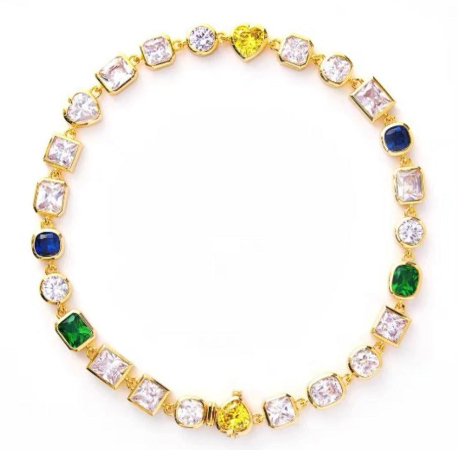 Pharrell Williams grills are studded with sapphires, rubies and emeralds. INFINITY GAUNTLETS jewelry diamond choker jacob &amp; co short necklace gemstone heart  Gabby Elan Jewelry infinity stone grillz grill grills