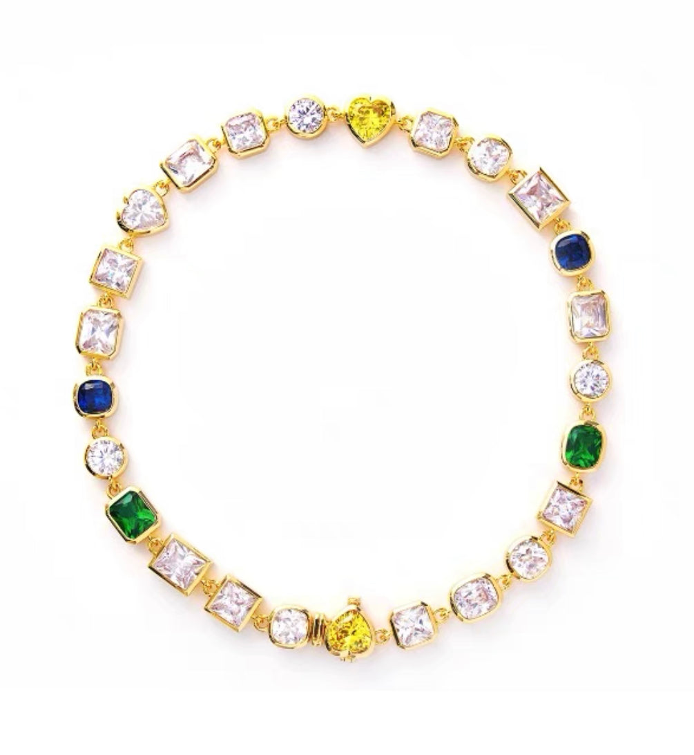 Pharrell Williams grills are studded with sapphires, rubies and emeralds. INFINITY GAUNTLETS jewelry diamond choker jacob &amp; co short necklace gemstone heart  Gabby Elan Jewelry infinity stone grillz grill grills