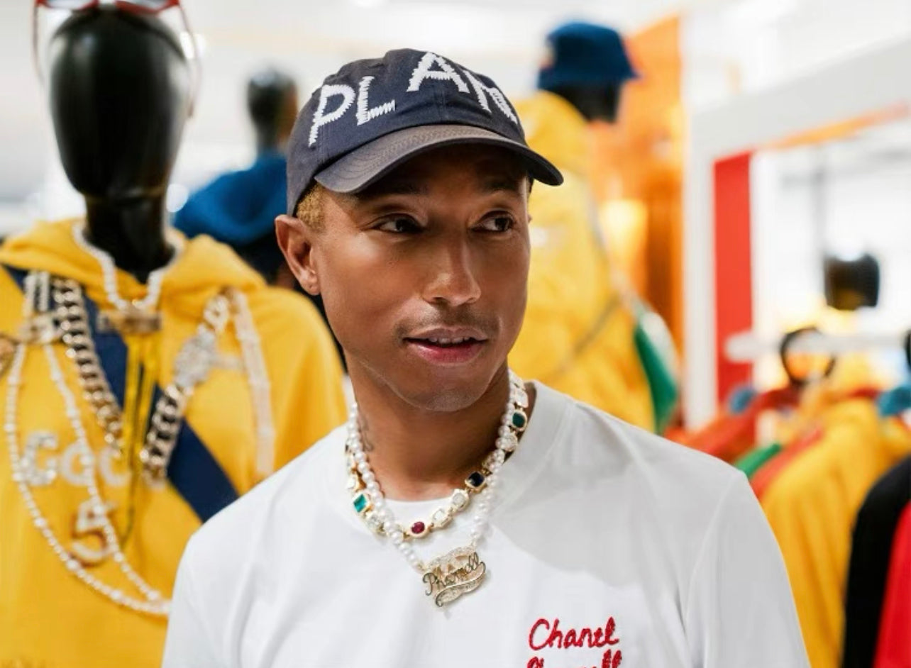Pharrell Williams grills are studded with sapphires, rubies and emeralds. INFINITY GAUNTLETS jewelry diamond choker jacob &amp; co short necklace gemstone heart Gabby Elan Jewelry infinity stone grillz grill grills