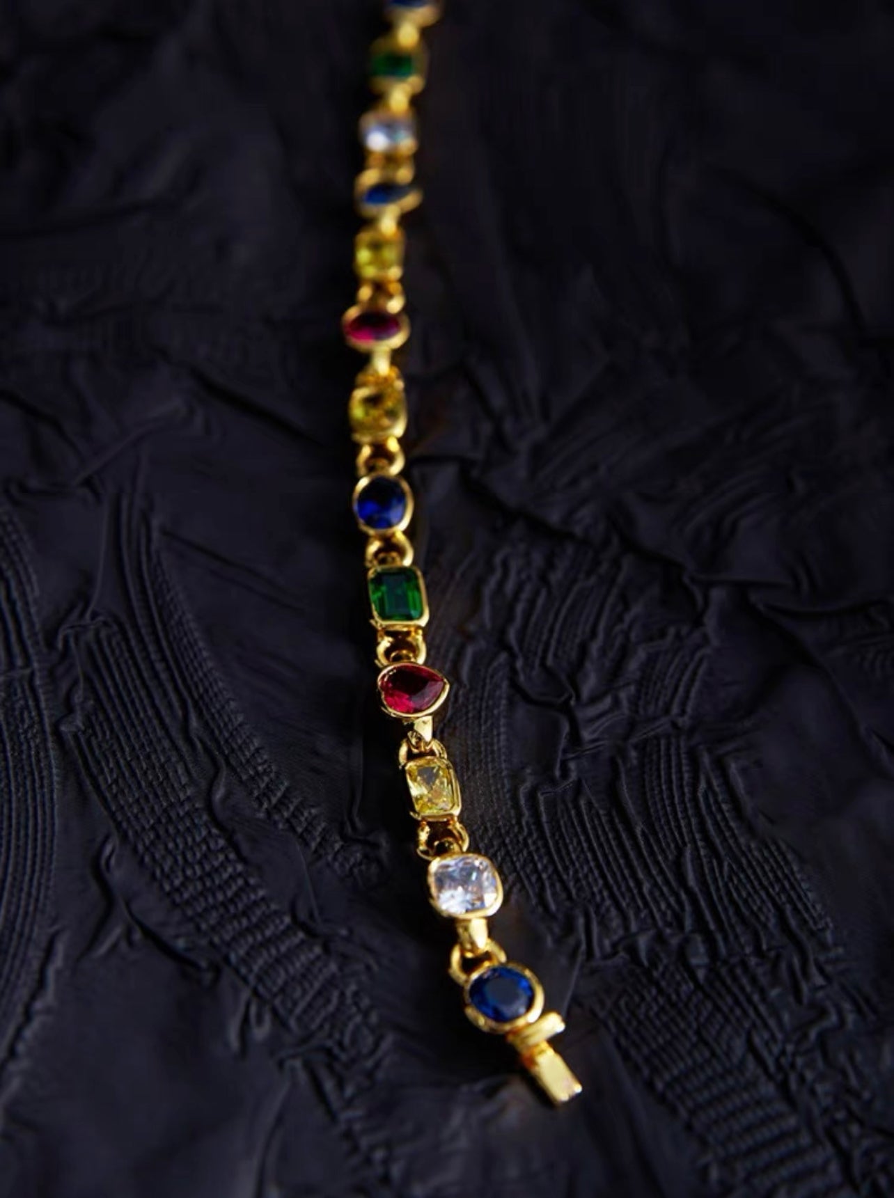 Pharrell Williams grills are studded with sapphires, rubies and emeralds. INFINITY GAUNTLETS jewelry diamond choker jacob &amp; co short necklace gemstone heart Gabby Elan Jewelry infinity stone grillz grill grills