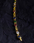 Pharrell Williams grills are studded with sapphires, rubies and emeralds. INFINITY GAUNTLETS jewelry diamond choker jacob & co short necklace gemstone heart Gabby Elan Jewelry infinity stone grillz grill grills