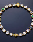 Pharrell Williams grills are studded with sapphires, rubies and emeralds. INFINITY GAUNTLETS jewelry diamond choker jacob & co short necklace gemstone heart Gabby Elan Jewelry infinity stone grillz grill grills