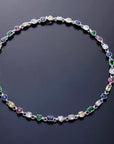 Pharrell Williams grills are studded with sapphires, rubies and emeralds. INFINITY GAUNTLETS jewelry diamond choker jacob & co short necklace gemstone heart Gabby Elan Jewelry infinity stone grillz grill grills