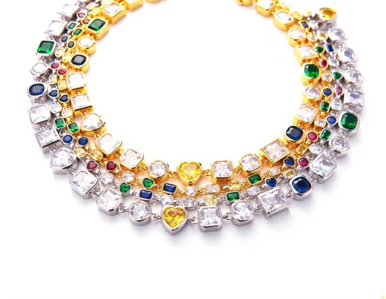 Pharrell Williams grills are studded with sapphires, rubies and emeralds. INFINITY GAUNTLETS jewelry diamond choker jacob &amp; co short necklace gemstone heart Gabby Elan Jewelry infinity stone grillz grill grills